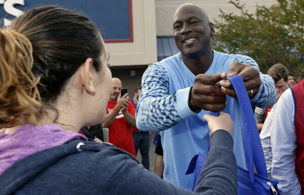 Michael Jordan returns home meets with hurricane victims AP News